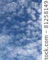 Autumn blue sky with muffled clouds flowing slowly 81258149