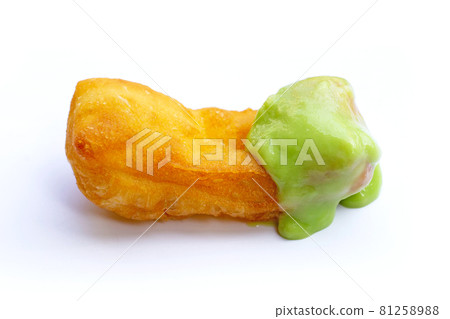 Deep-fried dough stick or chinese bread stick with steamed custard on white background. 81258988