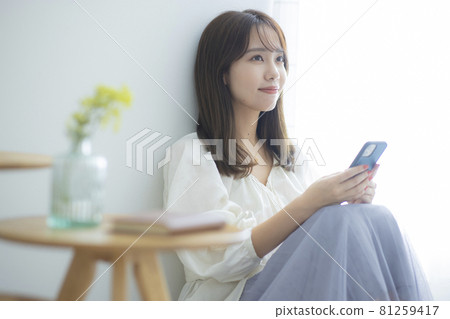 Female smartphone Female smartphone 81259417