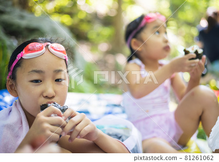 Children enjoying playing in the river Children enjoying playing in the river 81261062