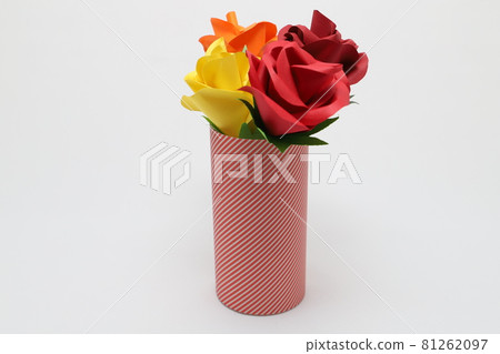 Handmade rose flowers made from origami are displayed in a beautiful vase Handmade rose flowers made from origami are displayed in a beautiful vase 81262097