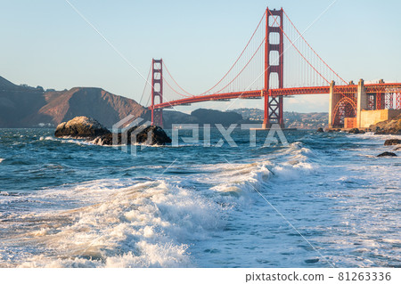 Landscape of Golden Gate bridge over sea horizon from Baker beach. 81263336