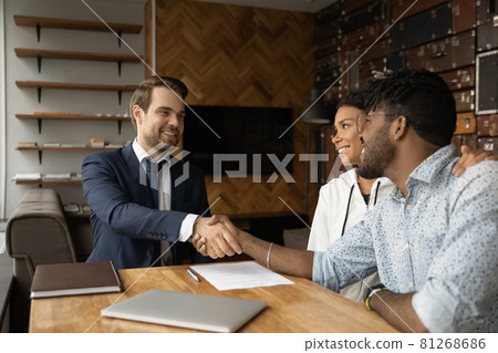 African family after sign contract shake hands bank advisor 81268686