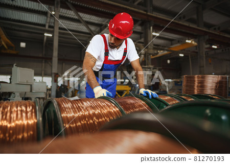 Portrait of african american male handyman working in an industrial factory Portrait of african american male handyman working in an industrial factory 81270193