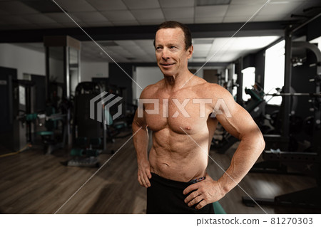 Portrait of a senior muscular man in a gym Portrait of a senior muscular man in a gym 81270303