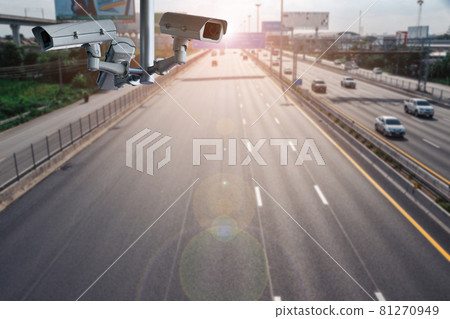 CCTV cameras on the overpass for recording on the road for safety and traffic violations. 81270949