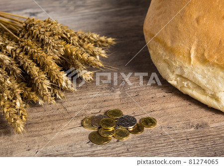 Kazakhstan tenge on the table with wheat ears and bread. Bread in Kazakhstan and Kazakhstan wheat. Kazakhstan tenge on the table with wheat ears and bread. Bread in Kazakhstan and Kazakhstan wheat. 81274065