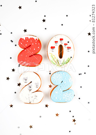 2022 set of gingerbread biscuits in shape of numbers of new year on white background 2022 set of gingerbread biscuits in shape of numbers of new year on white background 81274323