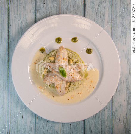 Baked sole fillet, risotto and pesto recipe Baked sole fillet, risotto and pesto recipe 81276220