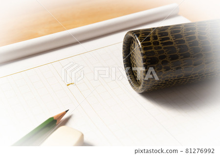 Manuscript paper and diploma tube, squares, education, graduation thesis Manuscript paper and diploma tube, squares, education, graduation thesis 81276992