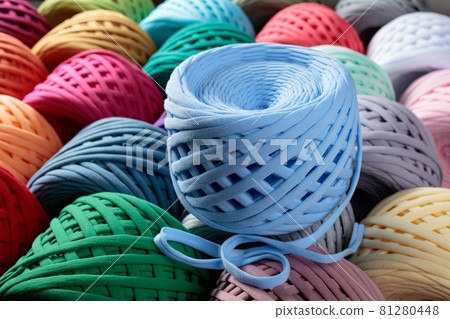 Skeins of colorful threads for needlework. 81280448