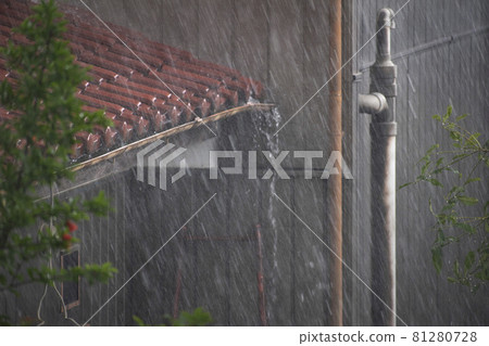 Residential area with heavy rain 81280728