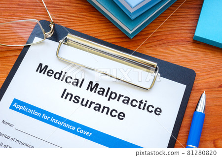 Medical malpractice insurance application and clipboard. Medical malpractice insurance application and clipboard. 81280820