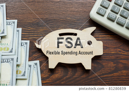 FSA flexible spending account words on the wooden piggy bank. FSA flexible spending account words on the wooden piggy bank. 81280839