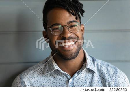 Head shot of happy African American guy with trendy haircut 81280850
