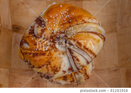 Baked sweet bread with red bean paste and white sesame seeds 81281916