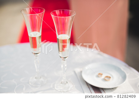 Luxury glasses with champagne on the table Luxury glasses with champagne on the table 81282409