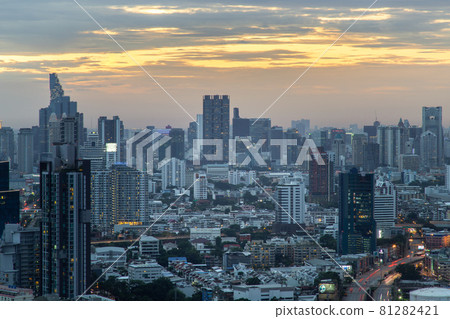 Aerial view of Beautiful scenery view of Skyscraper Evening time Sunset creates relaxing feeling for the rest of the day. 81282421