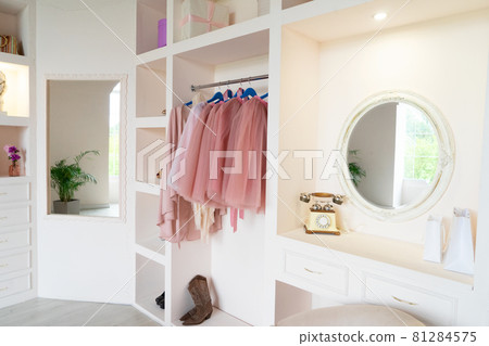 wardrobe with clothes 81284575