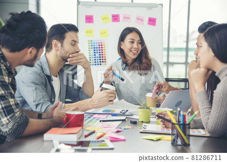 Creative design office center working teamwork. Happy business people partner plan strategy organization research people together at diversity office using laptop, smartphone company conference room Creative design office center working teamwork. Happy business people partner plan strategy organization research people together at diversity office using laptop, smartphone company conference room 81286711