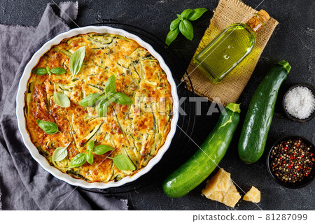 Scarpaccia, italian zucchini tart in a baking dish Scarpaccia, italian zucchini tart in a baking dish 81287099