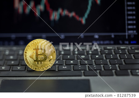 Bitcoin on computer with graph on background, Bit coin cryptocurrency banking money transfer business technology. Bitcoin currency price on computer screen. Bitcoin on computer with graph on background, Bit coin cryptocurrency banking money transfer business technology. Bitcoin currency price on computer screen. 81287539