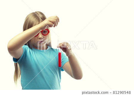 Little caucasian girl holding a test tube with red liquid on a white background Little caucasian girl holding a test tube with red liquid on a white background 81290548