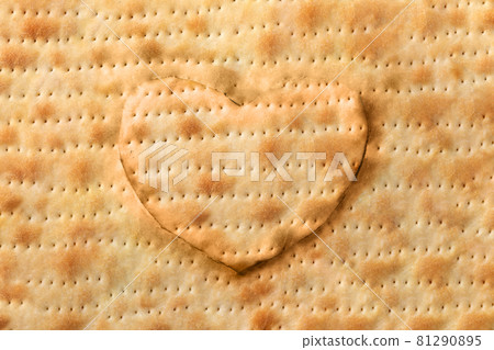 Heart shaped matza bread background Heart shaped matza bread background 81290895