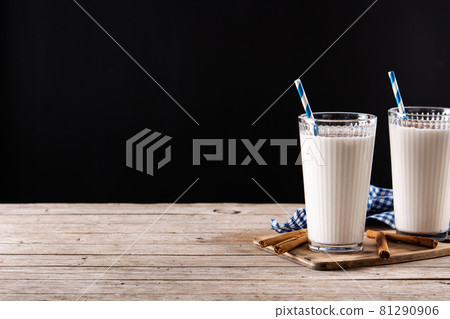 Fresh horchata with cinnamon in glass Fresh horchata with cinnamon in glass 81290906