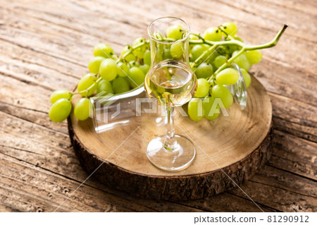 Italian golden grappa drink Italian golden grappa drink 81290912
