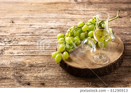 Italian golden grappa drink 81290913