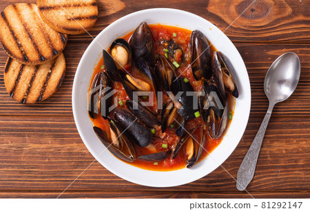 Traditional mussels tomato soup Traditional mussels tomato soup 81292147
