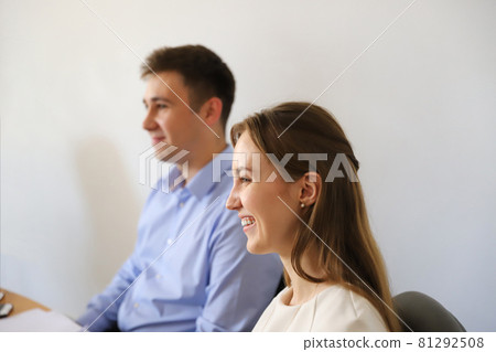 Confident business man and woman in a business meeting 81292508