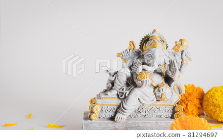 Happy Ganesh Chaturthi festival, Lord Ganesha statue with beautiful texture on white background, Ganesh is hindu god of Success. 81294697