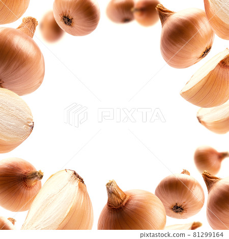 Ripe Golden onion levitates on a white background 81299164