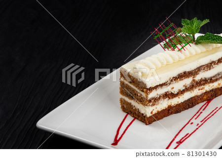 Plate with piece of delicious caramel cake Plate with piece of delicious caramel cake 81301430