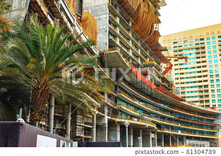 Building construction site in a street in Dubai 81304789