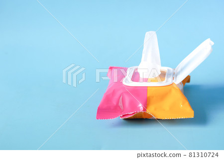 Cleansing wet wipes on blue with copy space Cleansing wet wipes on blue with copy space 81310724