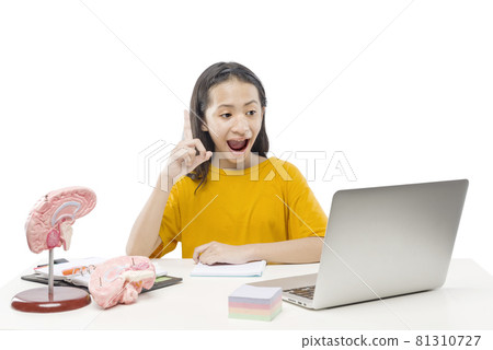 Asian little girl with laptop attending to online school class 81310727