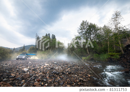 Car camping at mountain river Car camping at mountain river 81311753