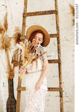 Cheerful woman with ginger hair Cheerful woman with ginger hair 81313587