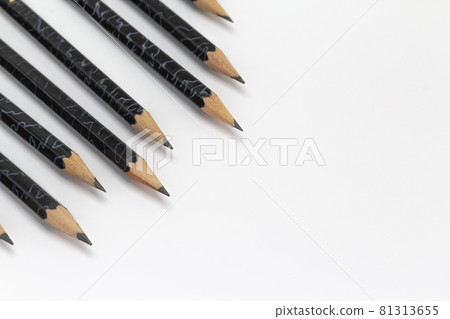 Black pencils, crayons on white backgrounds, copy space back to shool concept Black pencils, crayons on white backgrounds, copy space back to shool concept 81313655