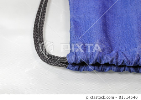 Close up gray drawstring bag or backpack with laces,  Sport bag isolated on white background. 81314540
