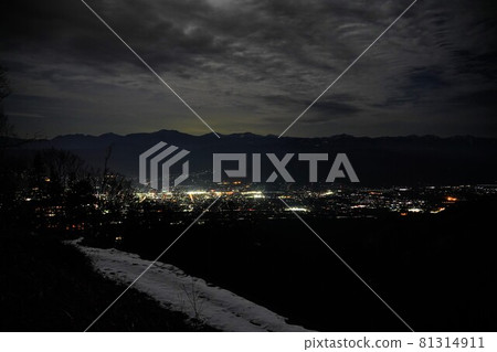 Night view of Komagane from the end of Mt. Utsugi forest road in winter and the Southern Alps Night view of Komagane from the end of Mt. Utsugi forest road in winter and the Southern Alps 81314911
