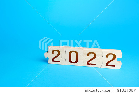 Puzzles and 2022. New Year and Christmas holidays. New opportunities and horizons. Plans and goals. Trends ideas. Summing up, drawing conclusions. Future. Business planning. Analytics, forecasting 81317097