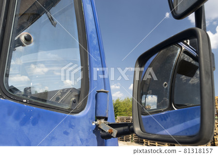 Retro side rear-view mirror on the road in the factory Retro side rear-view mirror on the road in the factory 81318157