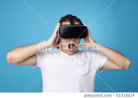 Young man using virtual reality headset. VR gadgets Young man using virtual reality headset. VR gadgets 81318814