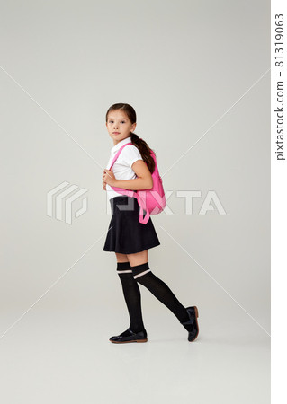adorable schoolgirl with backpack. Back to school 81319063