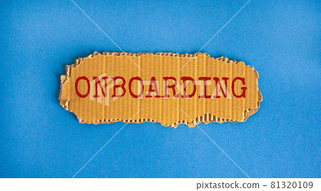 Onboarding symbol. The concept word 'onboarding' on the piece of cardboard. Beautiful blue background, copy space. Business and onboarding concept. Onboarding symbol. The concept word 'onboarding' on the piece of cardboard. Beautiful blue background, copy space. Business and onboarding concept. 81320109