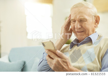 Aged man staying home and talking with therapist online Aged man staying home and talking with therapist online 81321533